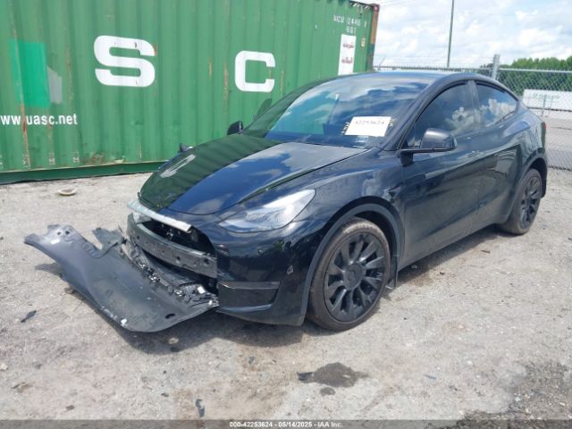 2024 TESLA MODEL Y 7SAYGDEE6RA218338 Photo 1