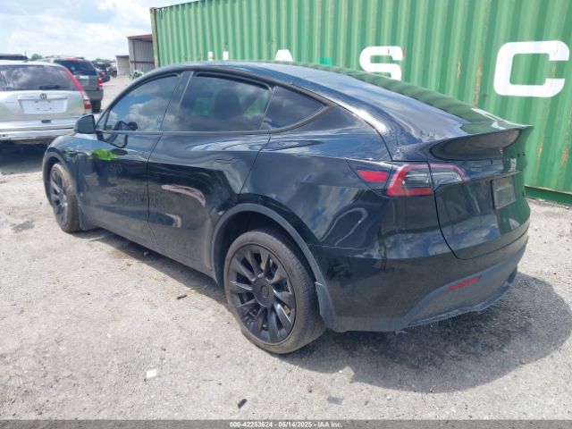2024 TESLA MODEL Y 7SAYGDEE6RA218338 Photo 2