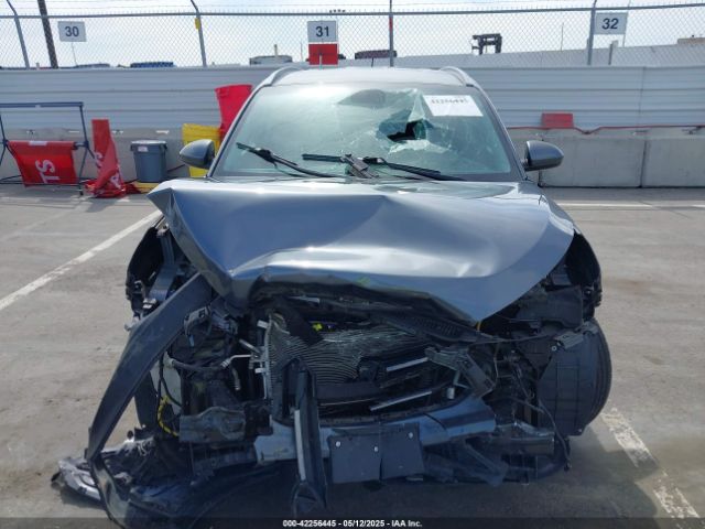 KM8J33A4XGU072482 Hyundai TUCSON SE