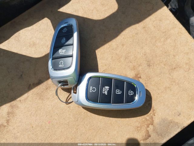 KM8JBCA1XNU015625 Hyundai Tucson Hybrid Blue