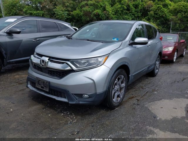 2018 HONDA CR-V 7FARW2H55JE012430 Photo 1