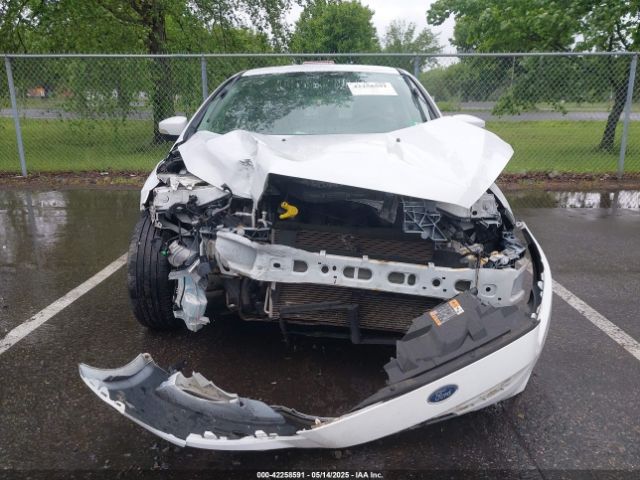 1FADP3K29GL354594 Ford FOCUS SE