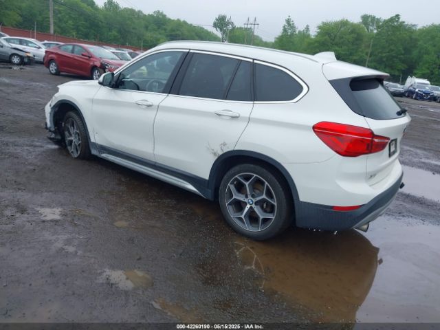 2018 BMW X1 WBXHT3C38J5L31322 Photo 2