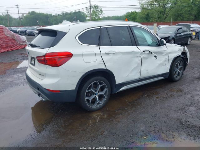 2018 BMW X1 WBXHT3C38J5L31322 Photo 3