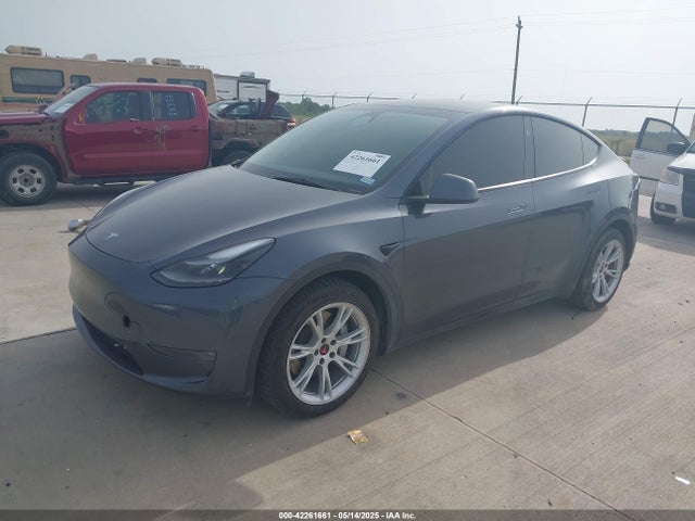 2023 TESLA MODEL Y 7SAYGDEE5PA170506 Photo 1