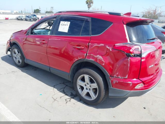 JTMWFREV8GJ096885 Toyota Rav4 Xle