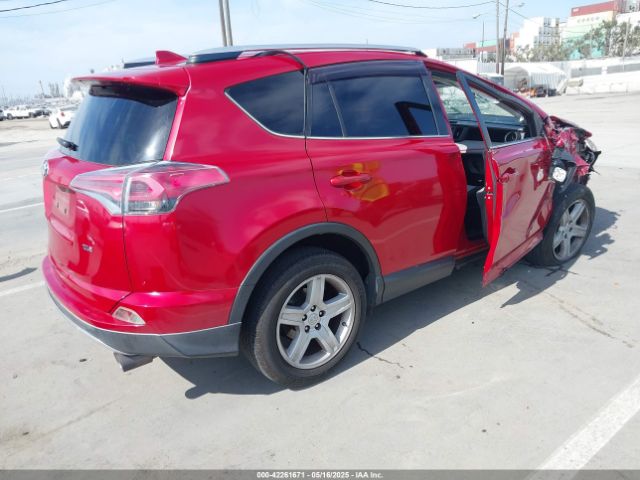 JTMWFREV8GJ096885 Toyota Rav4 Xle