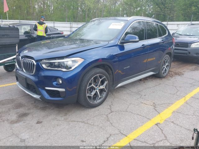 2016 BMW X1 WBXHT3C33GP883291 Photo 1