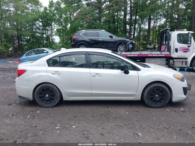 JF1GJAA64EH010565 Subaru Impreza 2.0i
