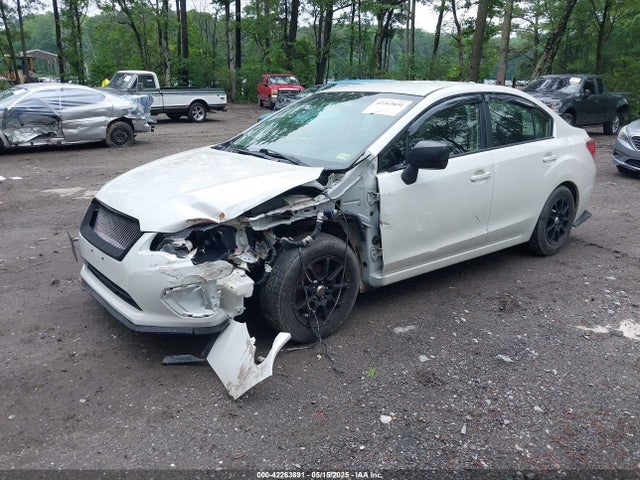 JF1GJAA64EH010565 Subaru Impreza 2.0i