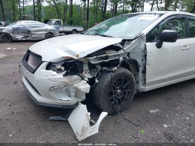JF1GJAA64EH010565 Subaru Impreza 2.0i