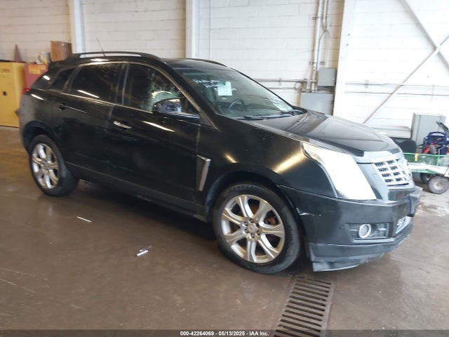 2014 CADILLAC SRX 3GYFNFE39ES659013 Photo 0