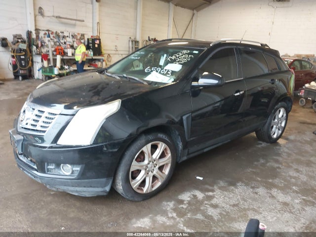 2014 CADILLAC SRX 3GYFNFE39ES659013 Photo 1