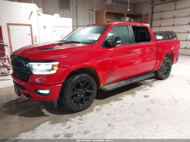 2021 RAM 1500 1C6SRFJT2MN729787 Photo 1
