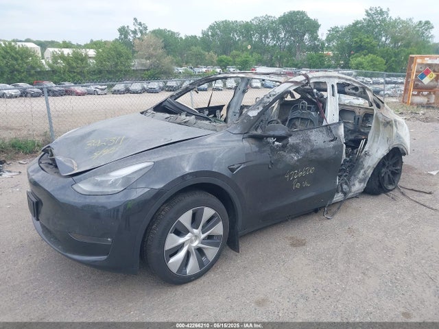 2024 TESLA MODEL Y 7SAYGDEE8RF991377 Photo 1
