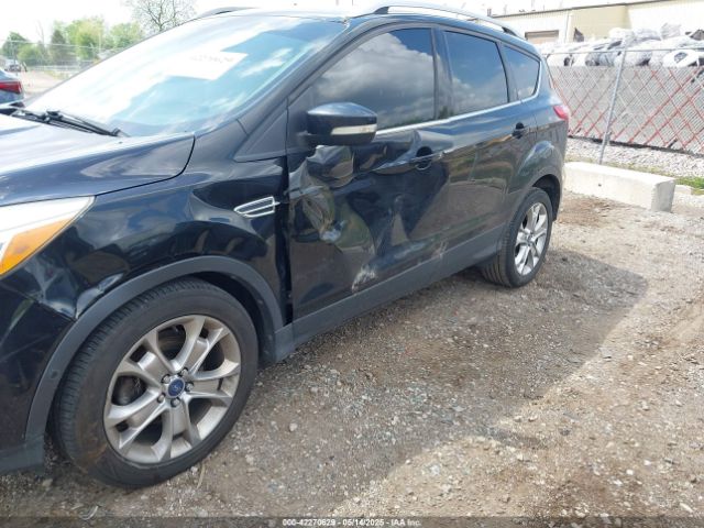 1FMCU0JX3EUC99606 Ford Escape Titanium