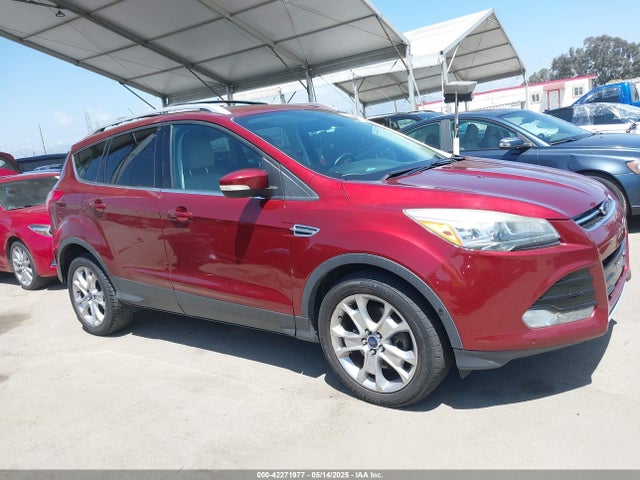 1FMCU0J98EUA76690 Ford 2014