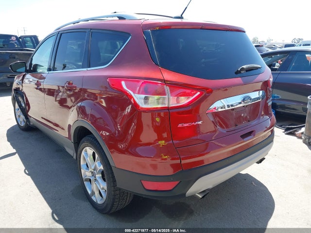 1FMCU0J98EUA76690 Ford 2014