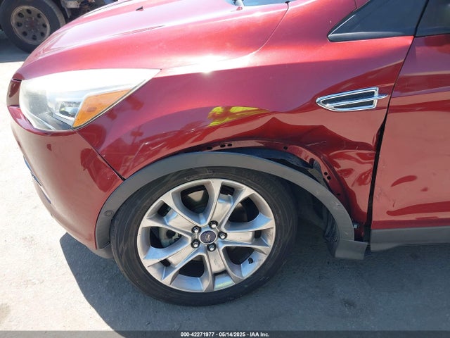 1FMCU0J98EUA76690 Ford 2014