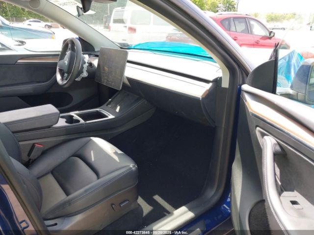 2023 TESLA MODEL Y 7SAYGDEF8PF592152 Photo 4