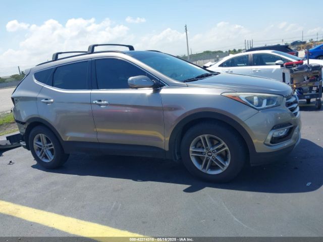 5NMZU3LB7JH064094 Hyundai Santa Fe Sport 2.4l
