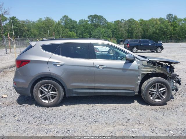 5NMZU3LB3HH031040 Hyundai Santa Fe Sport 2.4l