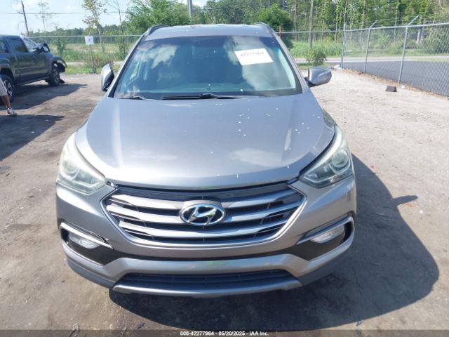 5NMZU3LB7HH025791 Hyundai Santa Fe Sport 2.4l