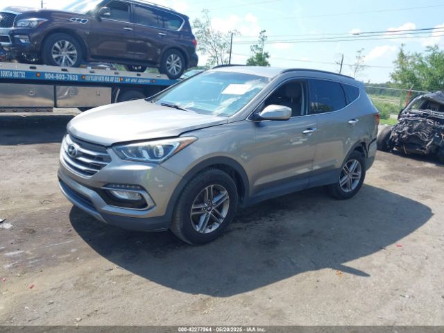 5NMZU3LB7HH025791 Hyundai Santa Fe Sport 2.4l