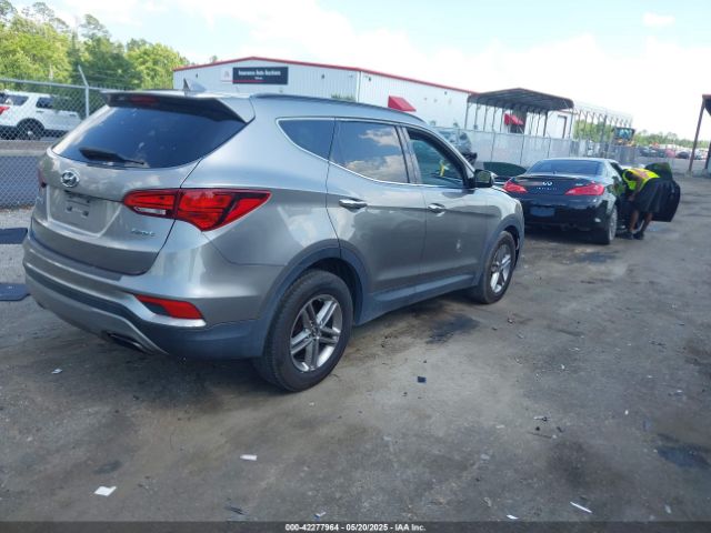 5NMZU3LB7HH025791 Hyundai Santa Fe Sport 2.4l