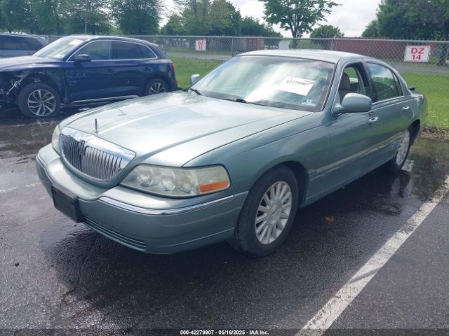 2004 LINCOLN TOWN CAR 1LNHM81WX4Y616283 Photo 1