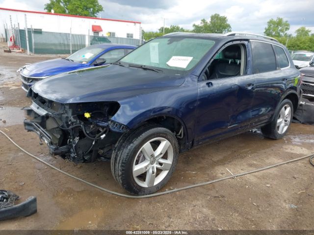 2011 VOLKSWAGEN TOUAREG WVGFF9BP0BD002958 Photo 1