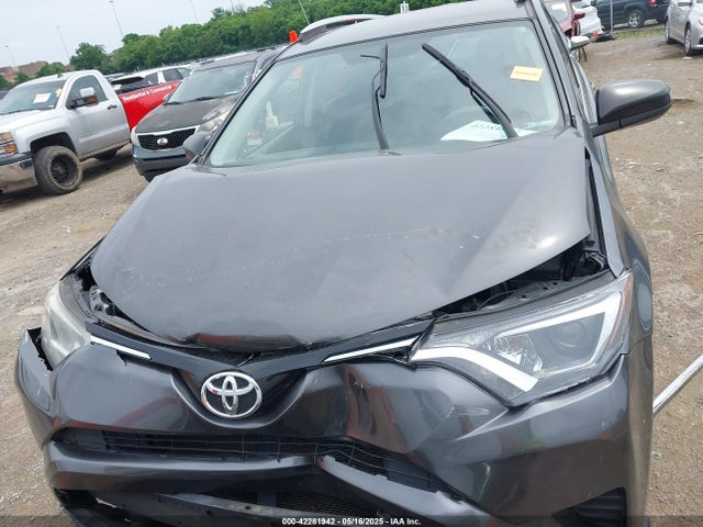 JTMZFREVXGJ072715 Toyota RAV4 LE
