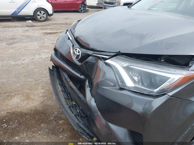 JTMZFREVXGJ072715 Toyota RAV4 LE