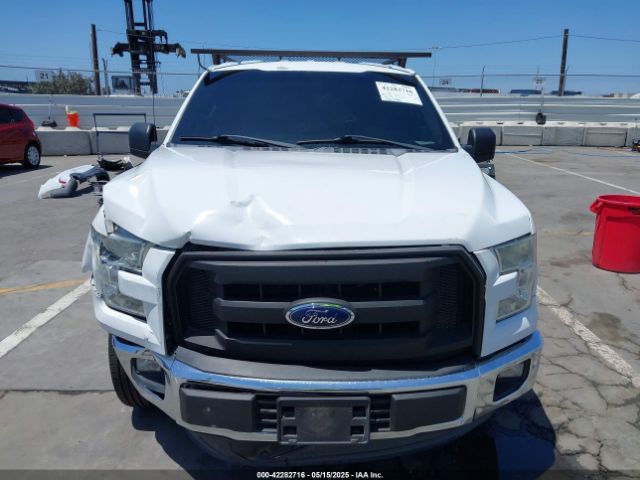 1FTMF1C80FKD06099 Ford 2015