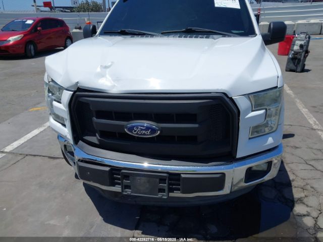 1FTMF1C80FKD06099 Ford 2015