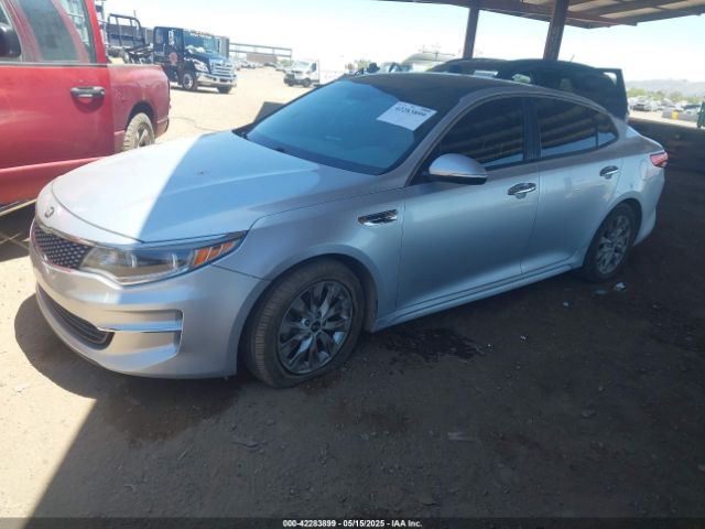 5XXGU4L33GG057043 KIA t-gdi theta ii