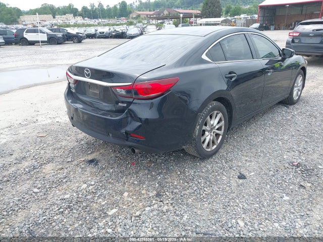 JM1GJ1U51G1447495 Mazda py