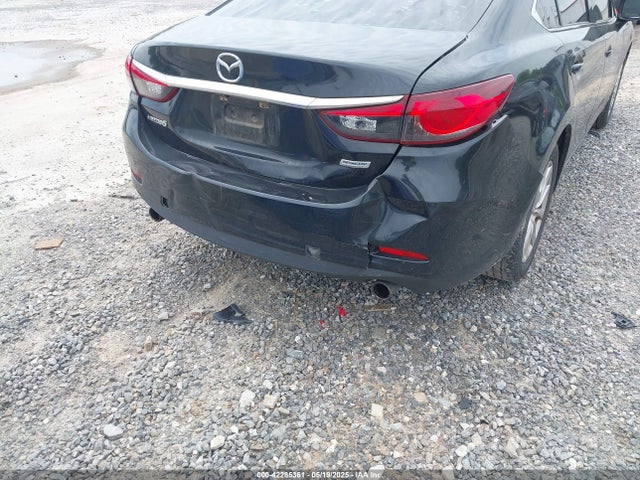 JM1GJ1U51G1447495 Mazda py