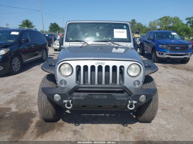 1C4AJWAG0EL126459 Jeep Wrangler Sport