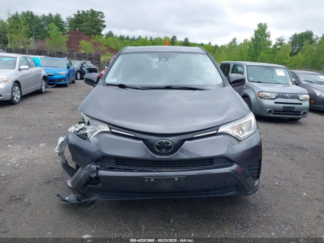 JTMBFREV0JJ734083 Toyota RAV4 LE
