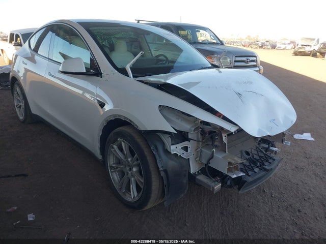 2023 TESLA MODEL Y 7SAYGAEE5PF642138 Photo 0