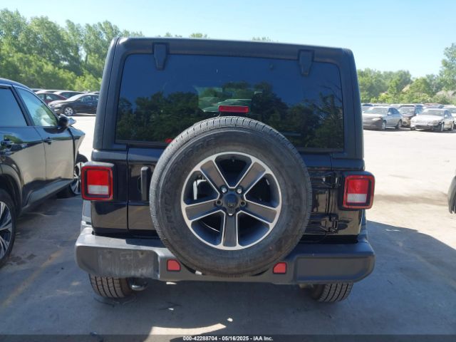 1C4HJXEN5PW702268 Jeep Wrangler 4-door Sahara 4x4