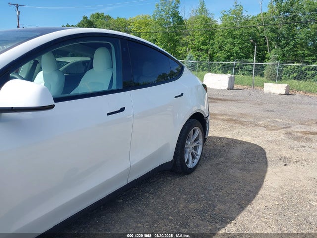 7SAYGDEE8PF591817 Tesla 2023