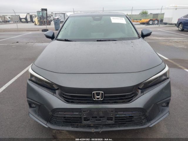 2HGFE1F97NH319651 Honda l15b7