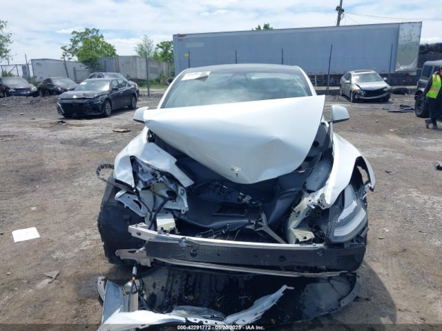 7SAYGDEE7NF363238 Tesla 2022