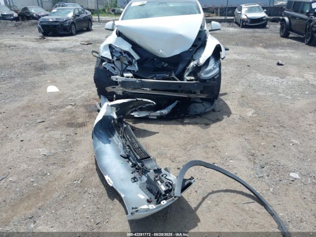 7SAYGDEE7NF363238 Tesla 2022