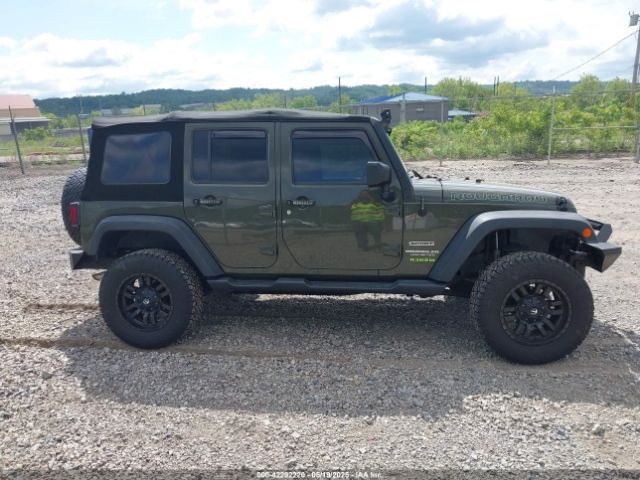 1C4BJWDG7GL113128 Jeep Wrangler Unlimited Sport