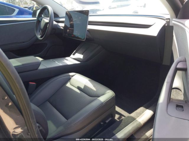 5YJ3E1EAXRF864994 Tesla 2024