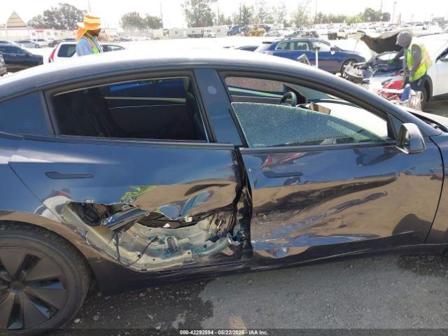 5YJ3E1EAXRF864994 Tesla 2024