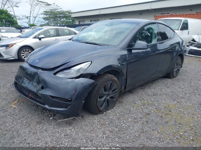 2024 TESLA MODEL Y 7SAYGDED5RF111338 Photo 1